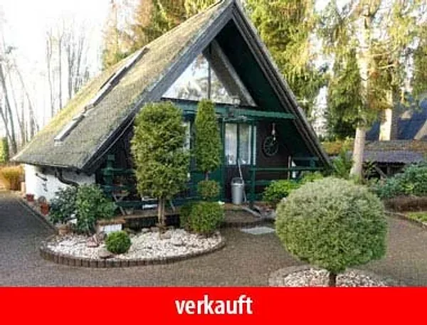 Vermitteltes Reetdachhaus